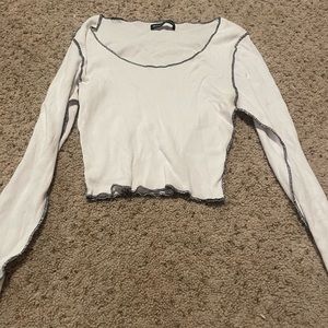 White long sleeve with black detailing